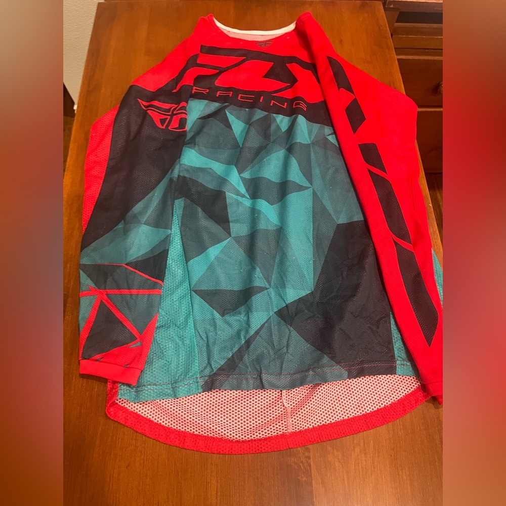 Fly race gear, red blue shirt, size small pants, size 34